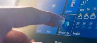 Microsoft Edge でブラウザーの下部にダウンロードを表示する